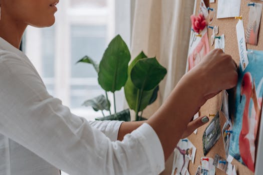 person watering plants with mindfulness